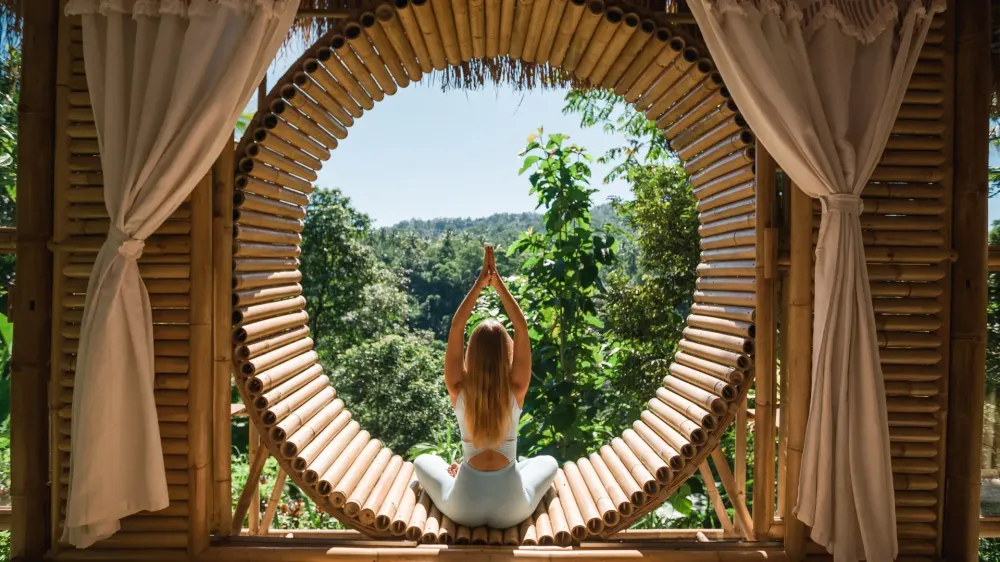 woman-yoga-pose-open-air-resort